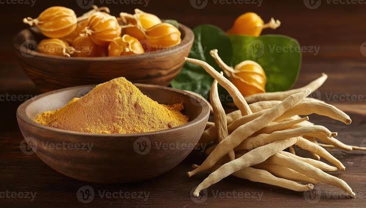 Ashwagandha root and powder on a wooden surface