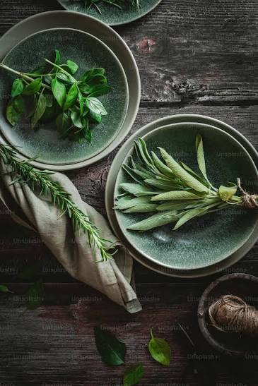 Various herbal powders and botanical extracts in bowls